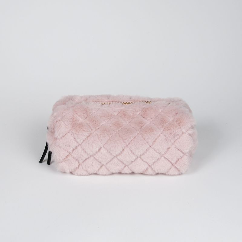 Liten makeup bag i fuskpels lys rosa
